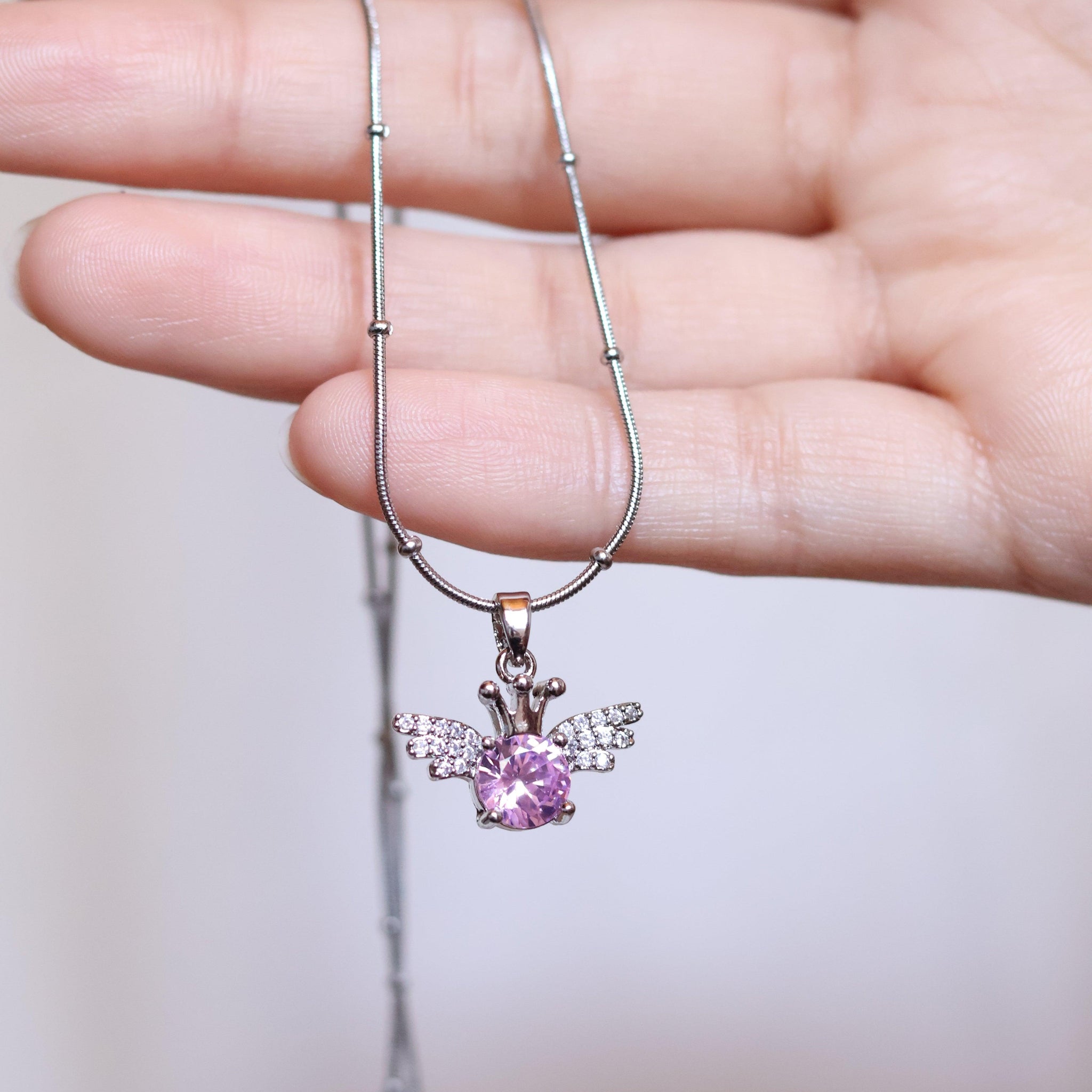 Kanatlı Kalp Figürlü Pembe Taşlı Çelik Kolye